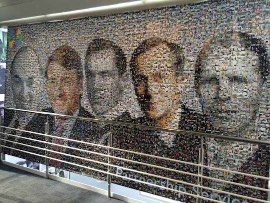 A photo mosaic - one of two - hanging in John Lewis' offices