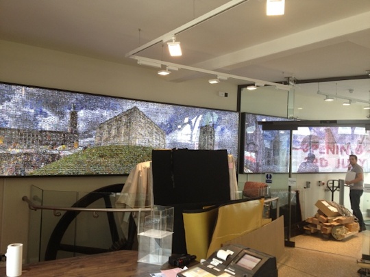 The social history photo mosaic in The Museum of Norwich at the Bridewell